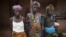 Women who survived the civil war pose for a portrait in the village of Bomaru, where the conflict started in 1991, in eastern Sierra Leone, April 22, 2012.