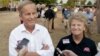 In this Thursday, Aug. 16, 2012 photograph, Rep. Todd Akin, R-Mo., and his wife Lulli, talk with reporters while attending the Governor's Ham Breakfast at the Missouri State Fair in Sedalia, Mo. 