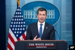 FILE - Transportation Secretary Pete Buttigieg speaks about the Francis Scott Key Bridge collapse during a press briefing at the White House, Wednesday, March 27, 2024, in Washington. (AP Photo/Evan Vucci)