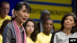 Burma's opposition leader Aung San Suu Kyi speaks during a town hall meeting hosted by Amnesty International in Washington on September 20, 2012. 