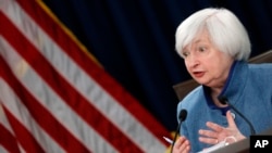 FILE - Federal Reserve Board Chair Janet Yellen answers a reporter's question during a news conference about the Federal Reserve's monetary policy, Dec. 14, 2016, in Washington. 