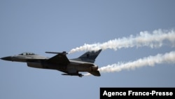 FILE - A Pakistani F-16 fighter jet flies past during a military parade in Islamabad, March 23, 2017. The U.S. and Pakistan are reportedly engaged in talks about the U.S. use of Pakistani airspace to conduct counterterror strikes against targets in Afghanistan.