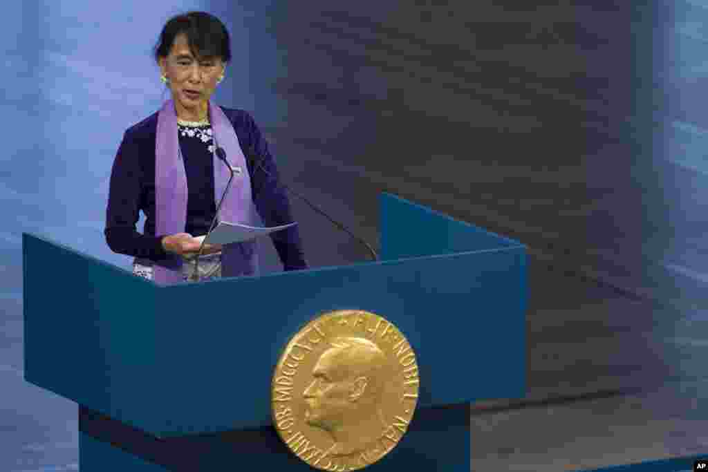 Aung San Suu Kyi, holds her speech during the Peace Nobel Prize lecture at the city hall in Oslo, June 16, 2012. She formally accepts the prize that thrust her into the global limelight two decades ago. 