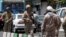 FILE - Members of the Iranian Revolutionary Guard are seen in Tehran, June 7, 2017. Two high-ranking commanders of the Iranian Revolutionary Guard Corps (IRGC) reportedly have been killed in Syria.