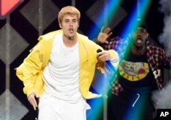FILE - Justin Bieber performs at the 2016 Jingle Ball at Staples Center in Los Angeles.