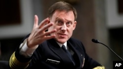 FILE - National Security Agency Director Admiral Mike Rogers testifies on Capitol Hill in Washington, May 9, 2017, before the Senate Armed Services Committee. 