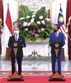 Presiden Jokowi dan PM Malaysia Muhyiddin dalam pernyataan pers bersama di Istana Merdeka, Jakarta, Jumat (5/2), mendesak ASEAN untuk bertindak atas Kudeta Myanmar (Foto: Courtesy/Biro Pers)