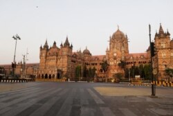 Chhatrapati Shivaji Maharaj Train Terminus wears a deserted look in Mumbai, India, Tuesday, March 24, 2020.
