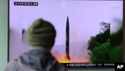 A man in South Korea watches a TV news program showing a reported missile launch conducted by North Korea, Oct. 20, 2016. The U.S. military called the event a "failed" North Korean missile launch.
