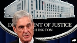 FILE - U.S. Special Counsel Robert Mueller talks to reporters about the Russia probe in this undated photo. 