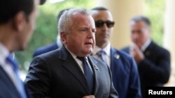 FILE - U.S. Deputy Secretary of State John J. Sullivan arrives at the Lopez Palace in Asuncion, Paraguay, Sept. 6, 2019.
