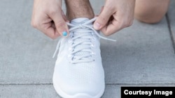 L'Oreal's UV Sense ultraviolet sensor is small enough to fit on a thumbnail. (L’Oreal)