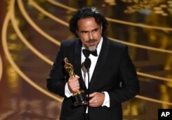 Alejandro G. Inarritu accepts the award for best director for “The Revenant” at the Oscars on Feb. 28, 2016, at the Dolby Theatre in Los Angeles.