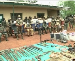 Cameroon military displaying weapons seized from separatists in Bamenda, March 4, 2021. (Moki Edwin Kindzeka/VOA)