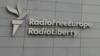 FILE - A sign for Radio Free Europe/Radio Liberty (RFE/RL) is pictured on the broadcaster's headquarters building, in Prague, Czech Republic, May 12, 2009. 