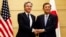 U.S. Secretary of State Antony Blinken, left, shakes hands with Japanese Prime Minister Shigeru Ishiba at Ishiba's office in Tokyo, Jan. 7, 2025.