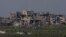Destroyed buildings by Israeli bombardments in the northern Gaza Strip as seen from southern Israel, March 5, 2025.