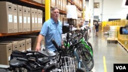 Don DiCostanzo, CEO and co-founder of Pedego, moved his bike manufacturing from China to Vietnam because of trade tariffs imposed by the U.S. on goods from China, including electric bikes. (VOA/ R. Kim)