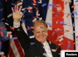 Democratic Alabama U.S. Senate candidate Doug Jones acknowledges supporters at the election night party in Birmingham, Alabama, Dec. 12, 2017.