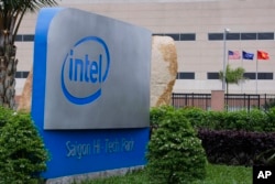 FILE - The logo of Intel Corp. is set up at its assembly and test facility at Saigon High Tech Park, Ho Chi Minh city, Vietnam.