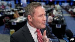 FILE - Michael Waltz speaks to reporters in Philadelphia, Pennsylvania, Sept. 10, 2024.