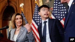 House Speaker Nancy Pelosi speaks with members of the media following a news conference on Hong Kong Human Rights on Capitol Hill in Washington, Sept. 18, 2019.