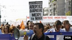 Aksi mogok menentang langkah-langkah penghematan pemerintah yang baru terus berlanjut di ibukota Athena.
