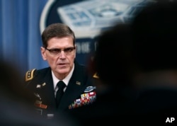 Gen. Joseph Votel speaks during a news conference with Defense Secretary Jim Mattis at the Pentagon, April 11, 2017.