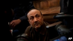FILE - Senior Fatah leader Marwan Barghouti appears at Jerusalem's court. 