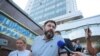 Kirill Vyshinsky, director of the Ukrainian office of the Russian state news agency RIA Novosti, who was detained on treason charges in 2018, talks to the media after a court ordered his release on bail, in Kyiv, Ukraine, Aug. 28, 2019. 