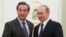 Russian President Vladimir Putin, right, shakes hands with Chinese Foreign Minister Wang Yi during their meeting in Moscow, Russia, March 11, 2016.