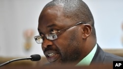 South Africa ICC Withdrawal: South Africa's minister of justice and correctional services, Michael Masutha, speaks to the press in Pretoria, South Africa, Friday, Oct. 21, 2016. Masutha said South Africa will soon submit a bill in parliament to withdraw f