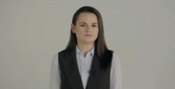 Belarusian opposition politician Sviatlana Tsikhanouskaya addresses the nation in Vilnius, Lithuania, in this still image taken from handout video released Aug. 21, 2020.