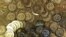 FILE - A pile of bitcoin tokens are shown April 2013.