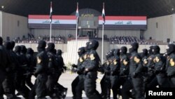 Iraqi Prime Minister Haider al-Abadi attends the celebrates victory over Islamic State militants with military parade in Baghdad, July 15, 2017.