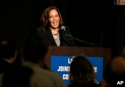 FILE - U.S. Sen. Kamala Harris, a candidate for the 2020 Democratic presidential nomination, addresses labor leaders at the California Labor Federal and State Building and Construction Trades Council Legislative Conference Dinner, April 1, 2019, in Sacramento, Calif.