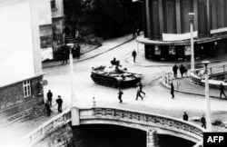 FILE - A photo taken in August 1968 in Trutnov shows a tank as Soviet-led Warsaw Pact troops and tanks invade Czechoslovakia to crush the so-called Prague Spring reform and re-establish a totalitarian regime.