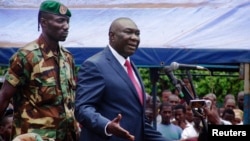 Central African Republic's new President Michel Djotodia speaks to his supporters at a rally in favor of the Seleka rebel coalition in downtown Bangui Mar. 30, 2013.