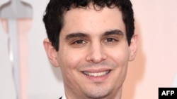 FILE - Director Damien Chazelle attends the 87th Annual Academy Awards at Hollywood & Highland Center on February 22, 2015 in Hollywood, California. The world's oldest film festival will open with Damien Chazelle's "La La Land", starring Emma Stone and Ryan Gosling.