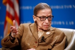 FILE - U.S. Supreme Court Associate Justice Ruth Bader Ginsburg speaks during a discussion on the 100th anniversary of the ratification of the 19th Amendment at Georgetown University Law Center in Washington, Feb. 10, 2020