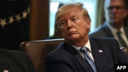 U.S. President Donald Trump participates in a Cabinet meeting at the White House, July 16, 2019. 
