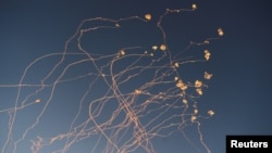 Rockets launched from Lebanon into Israel are intercepted, amid ongoing cross-border hostilities between Hezbollah and Israeli forces, June 27, 2024.