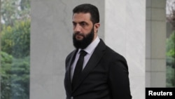 Pemimpin de facto Suriah, Ahmad Al-Sharaa atau dikenal sebagai Abu Mohammed al-Jolani, tampak di Damaskus, Suriah, Senin, 30 Desember 2024. (Foto: Khalil Ashawi/Reuters)