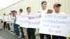 Security guards, terminated over allegations of sharing child pornography, and members of their families, protest in front of the U.S. Embassy in Phnom Penh, Cambodia, June 19 2018. (T. Malis/VOA Khmer) 