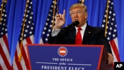 President-elect Donald Trump speaks during a news conference in the lobby of Trump Tower in New York, Jan. 11, 2017. 