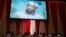 A previous address to the United Nations by former South African President Nelson Mandela is shown on a video screen during an informal meeting of the plenary of the General Assembly to commemorate Nelson Mandela International Day at the United Nations he
