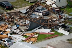 Destruction is seen in the aftermath of Hurricane Ida, Aug. 30, 2021, in Houma, La. The weather died down shortly before dawn.