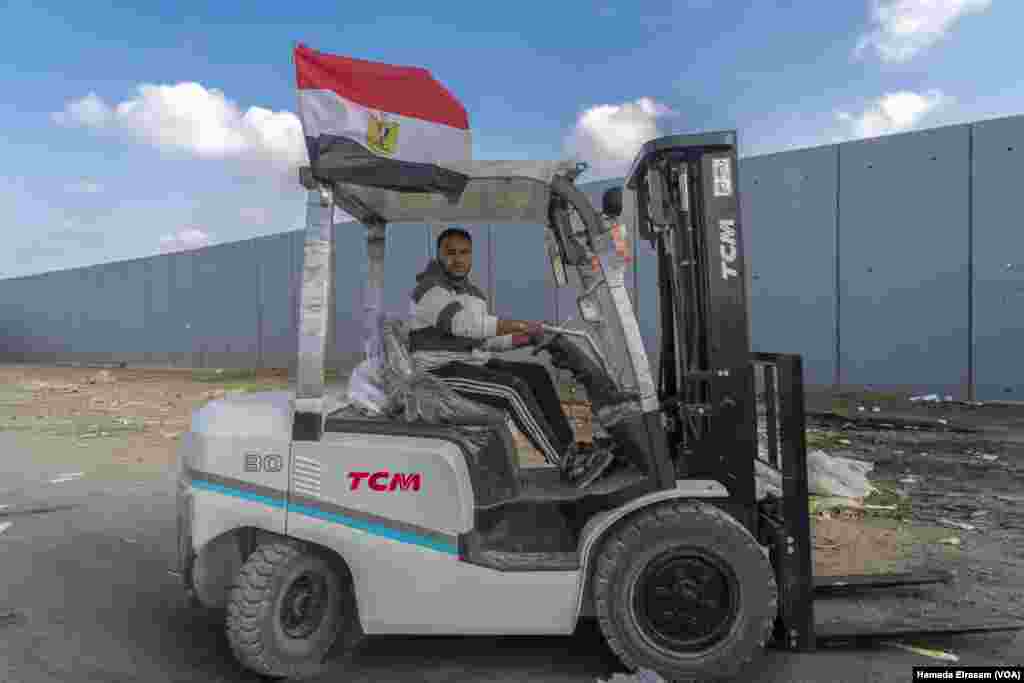 Mohamed Riad, an Egyptian forklift driver, says there are strict pallet size requirements and failing to meet them means depriving the people of Gaza of desperately needed aid. Rafah, Egypt, Feb. 4, 2025.