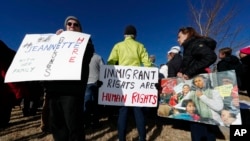 Supporters hold up a placard during a rally in for Jeanette Vizguerra, a Mexican woman seeking to avoid deportation from the United States, outside the Immigration and Customs Enforcement office in Centennial, Colorado.