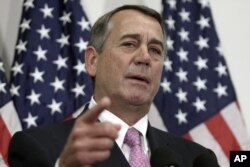 FILE - Outgoing House Speaker John Boehner of Ohio talks with reporters on Capitol Hill in Washington, Oct. 27, 2015. House Republican leaders pushed toward a vote on a two-year budget deal despite conservative opposition.